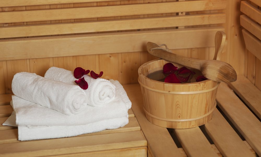 Sauna bucket with rose petals