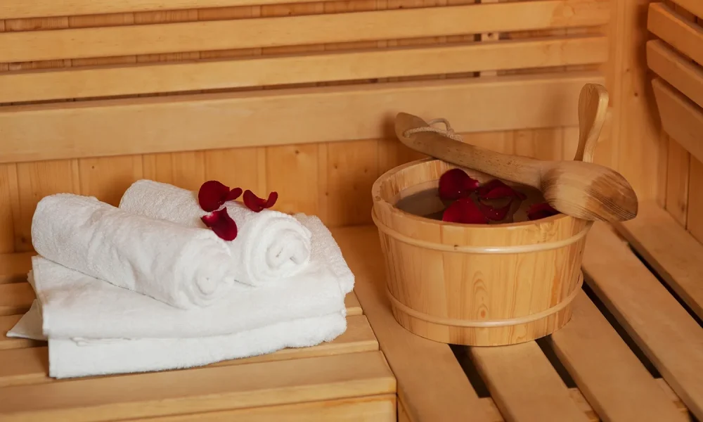 Sauna bucket with rose petals